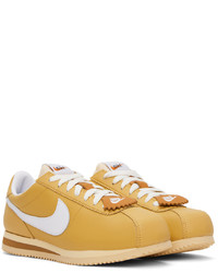 goldene Leder Sportschuhe von Nike