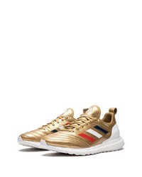 goldene Leder Sportschuhe von adidas