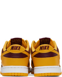 goldene Leder Sportschuhe von Nike