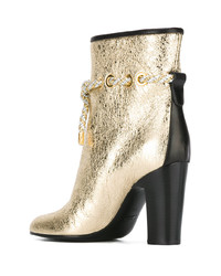 goldene Leder Stiefeletten von Michel Vivien