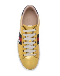 goldene niedrige Sneakers von Gucci