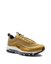 goldene niedrige Sneakers von Nike