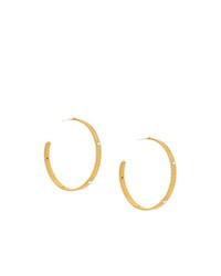 goldene Ohrringe von Charlotte Valkeniers