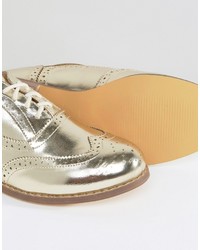 goldene Schuhe von London Rebel