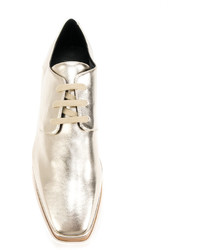 goldene Schuhe von Stella McCartney