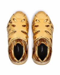 goldene Sportschuhe von Dolce & Gabbana