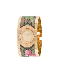 goldene Uhr mit Blumenmuster von Gucci