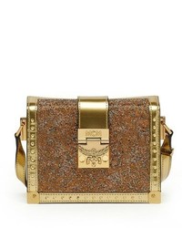 goldene verzierte Ledertaschen