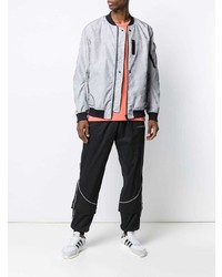 graue Bomberjacke von Stone Island Shadow Project