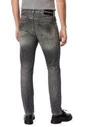 graue enge Jeans mit Destroyed-Effekten von Calvin Klein