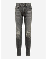 graue enge Jeans mit Destroyed-Effekten von Calvin Klein