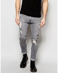 graue enge Jeans mit Destroyed-Effekten von Cheap Monday