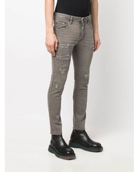 graue enge Jeans mit Destroyed-Effekten von DSQUARED2