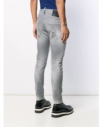 graue enge Jeans mit Destroyed-Effekten von DSQUARED2