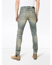 graue enge Jeans mit Destroyed-Effekten von Amiri