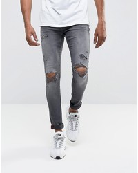 graue enge Jeans mit Destroyed-Effekten von DML