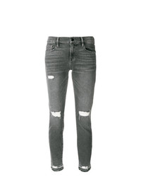 graue enge Jeans mit Destroyed-Effekten von Frame Denim