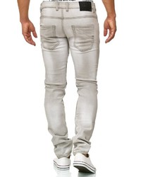 graue enge Jeans mit Destroyed-Effekten von INDICODE