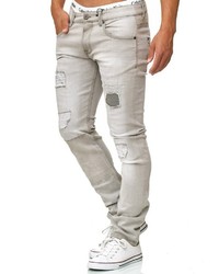 graue enge Jeans mit Destroyed-Effekten von INDICODE