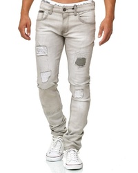 graue enge Jeans mit Destroyed-Effekten von INDICODE