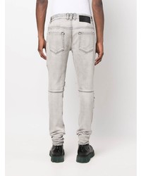 graue enge Jeans mit Destroyed-Effekten von Balmain