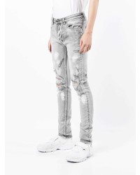 graue enge Jeans mit Destroyed-Effekten von Ksubi