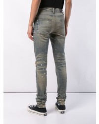 graue enge Jeans mit Destroyed-Effekten von Amiri