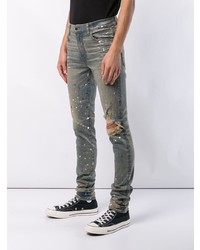 graue enge Jeans mit Destroyed-Effekten von Amiri