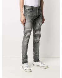 graue enge Jeans mit Destroyed-Effekten von Balmain