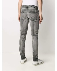 graue enge Jeans mit Destroyed-Effekten von Balmain