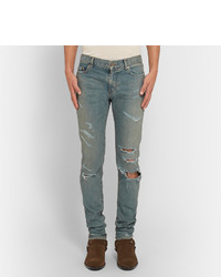 graue enge Jeans mit Destroyed-Effekten von Saint Laurent