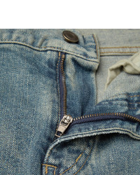 graue enge Jeans mit Destroyed-Effekten von Saint Laurent