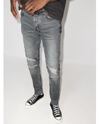 graue enge Jeans mit Destroyed-Effekten von Ksubi