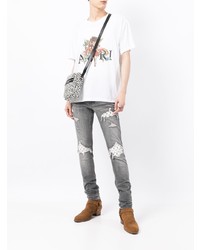 graue enge Jeans mit Destroyed-Effekten von Amiri