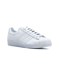 graue horizontal gestreifte Leder niedrige Sneakers von adidas