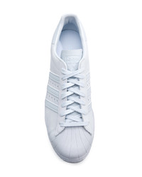 graue horizontal gestreifte Leder niedrige Sneakers von adidas