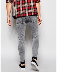 graue Jeans mit Destroyed-Effekten von Asos