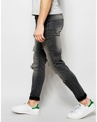 graue Jeans mit Destroyed-Effekten von Asos