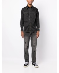 graue Jeans mit Destroyed-Effekten von Ksubi