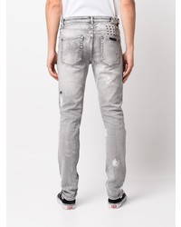 graue Jeans mit Destroyed-Effekten von Ksubi