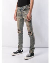 graue Jeans mit Destroyed-Effekten von Amiri