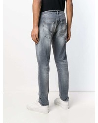 graue Jeans mit Destroyed-Effekten von Dondup