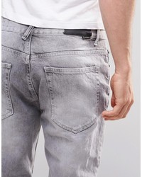 graue Jeans mit Destroyed-Effekten von Religion