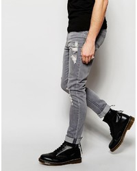 graue Jeans mit Destroyed-Effekten von Cheap Monday