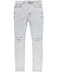 graue Jeans mit Destroyed-Effekten von Ksubi