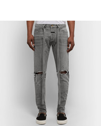 graue Jeans mit Destroyed-Effekten von Fear Of God