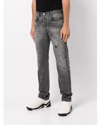 graue Jeans mit Destroyed-Effekten von John Elliott