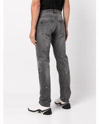 graue Jeans mit Destroyed-Effekten von John Elliott