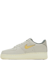 graue Leder niedrige Sneakers von Nike