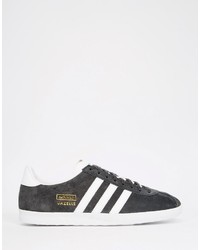 graue Leder Turnschuhe von adidas